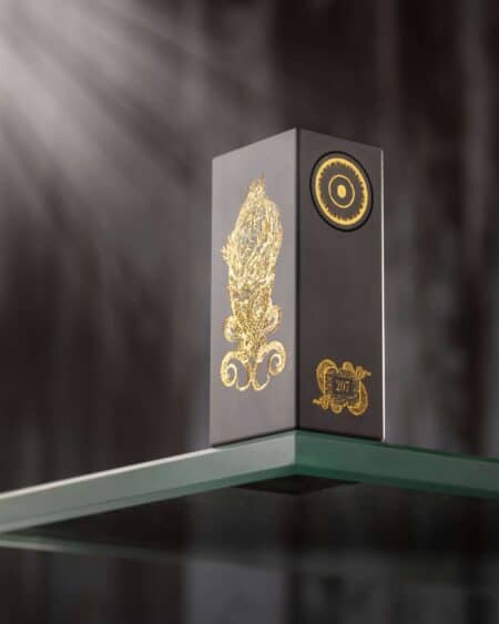 Black-Gold-Cthylla-Mod-Deathwish-Modz-UK Available At Dispergo Vaping The Cthylla Deathwish Mod powered by a single 21700 battery, designed for Vape Enthusiasts In Black Gold